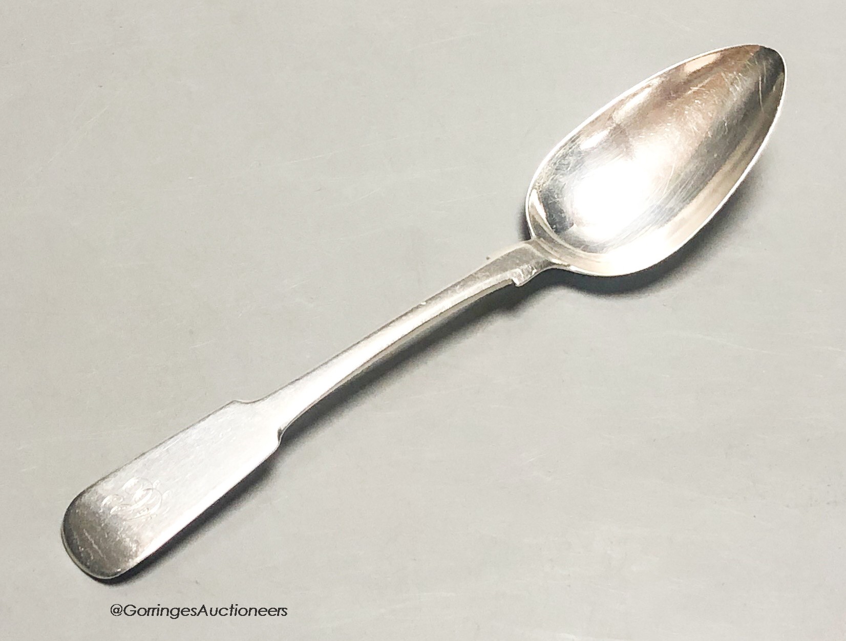 An early 19th century Scottish provincial silver fiddle pattern dessert spoon, by John & Patrick Riach, Forres, c.1825, 17.4cm, 34 grams.